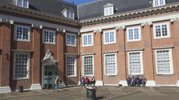 Visitors relaxing in the central courtyard of the Amsterdam Museum