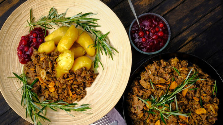 Sauteed reindeer with lingonberry jam and potatoes.