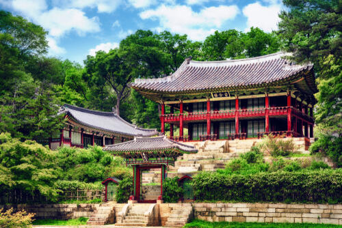 Dramatic pavilion surrounded by trees at Changdeokgung Palace in Seoul