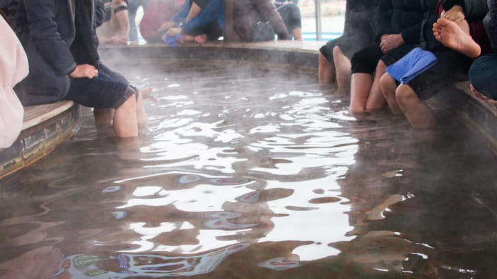 Koreans dipping their feet in the therapeutic waters at a traditional jjimjilbang.