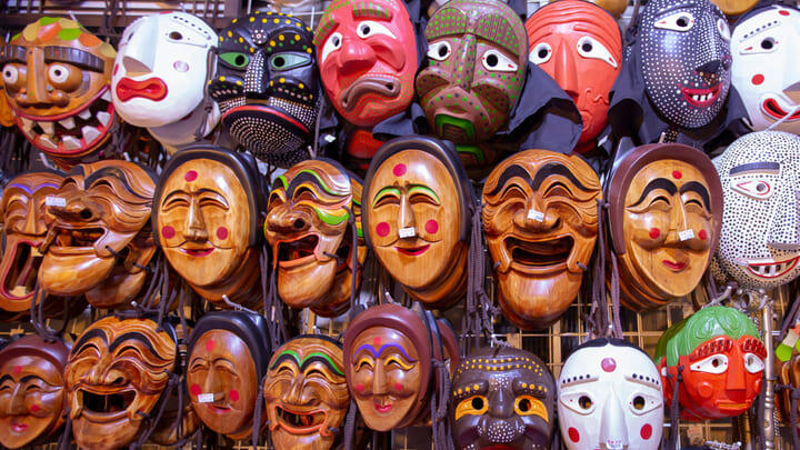 Traditional carved and painted Korean masks hanging in a store in Insa-dong, Seoul.
