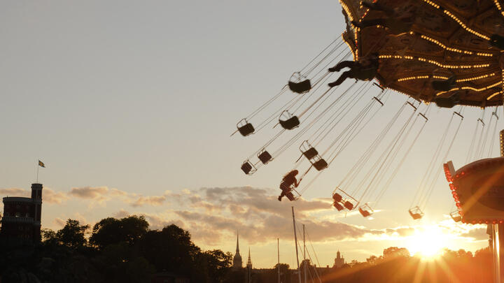 A fairground ride at sunset in Stockholm's Gröna Lund amusement park
