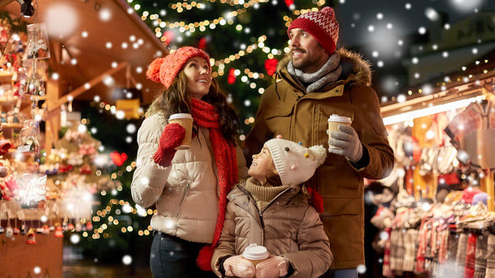 Family visiting a Christmas market