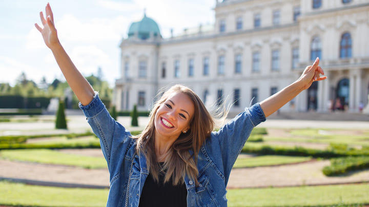 Woman outside the Belvedere in Vienna.