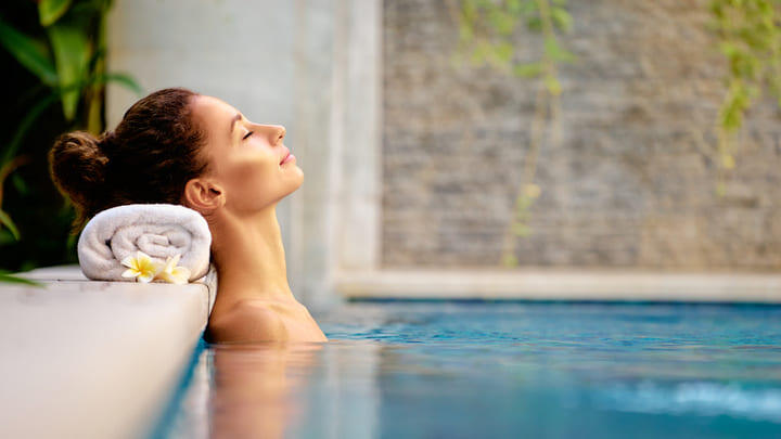 Woman relaxing in a spa.