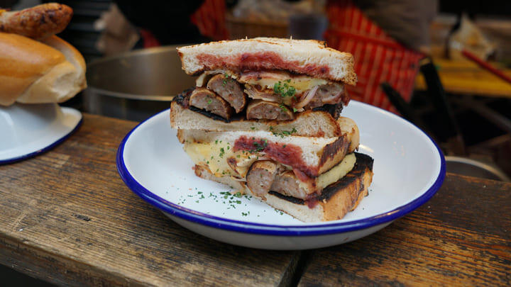 Sausage sandwich at Maltby Street Market in Bermondsey, South London.