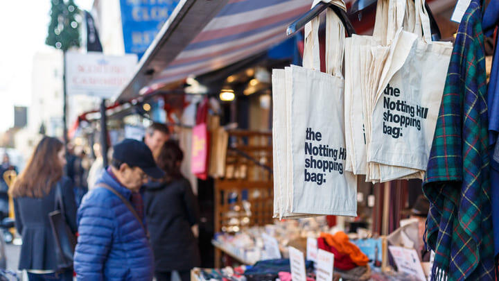 Shoppers browsing the stalls at Portobello Road Market, West London.