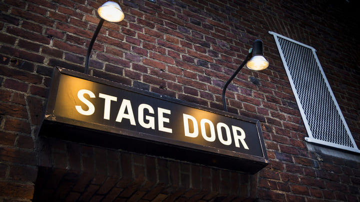 Stage door sign in London's West End theater district.