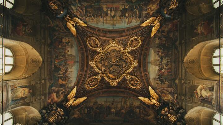 Ceiling detail inside the Louvre Museum in Paris.