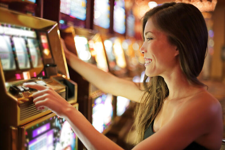 Playing slots at a casino in Vegas