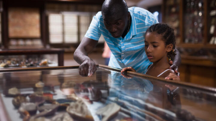 African American Museum father and daughter explore exhibits