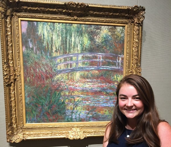 Go Boston Card customer in front of a Monet painting at the Museum of Fine Arts
