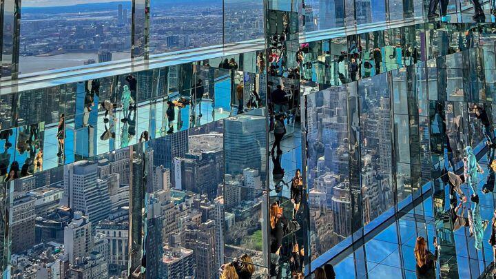 Observation deck of SUMMIT One Vanderbilt, with multiple reflections in large areas of glass