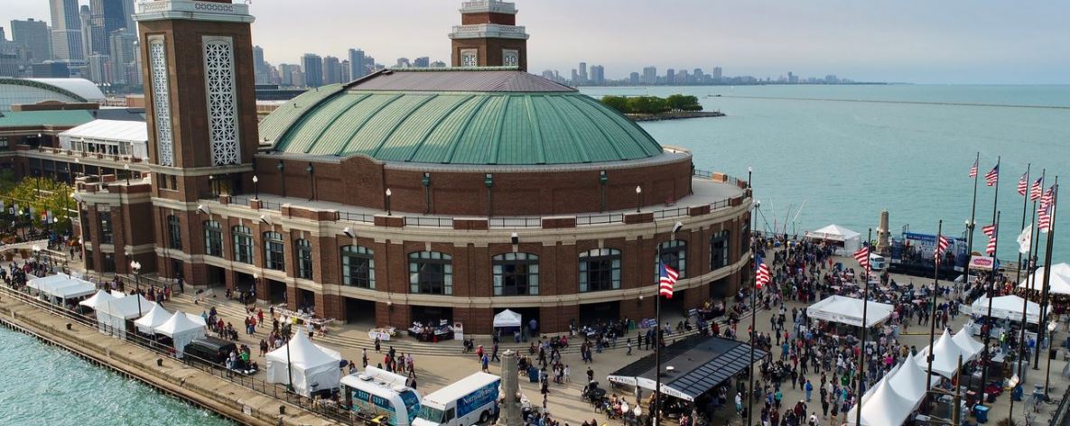 An aerial view of Navy Pier with tents set up.