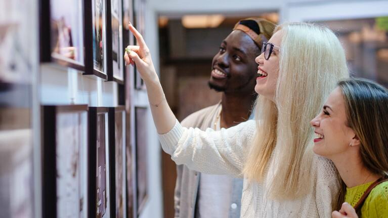 A group of friends at an art gallery