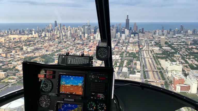 The Chicago skyline from a helicopter cockpit