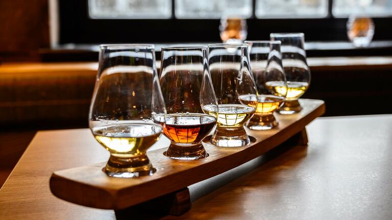 A row of spirits to sample at Koval Distillery
