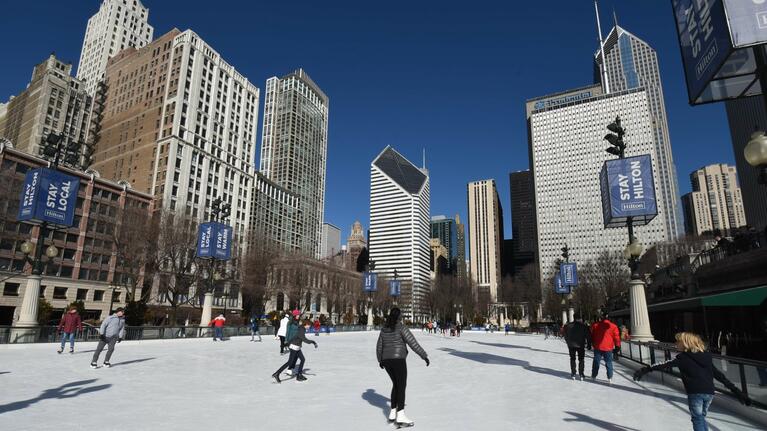 Skaters enjoying the ice in Chicago at Christmas