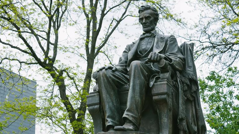 A bronze statue of Abraham Lincoln in Chicago