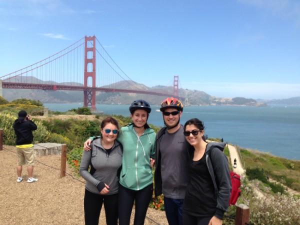 Biking over the Golden Gate Bridge is a fun activity for a group of friends.
