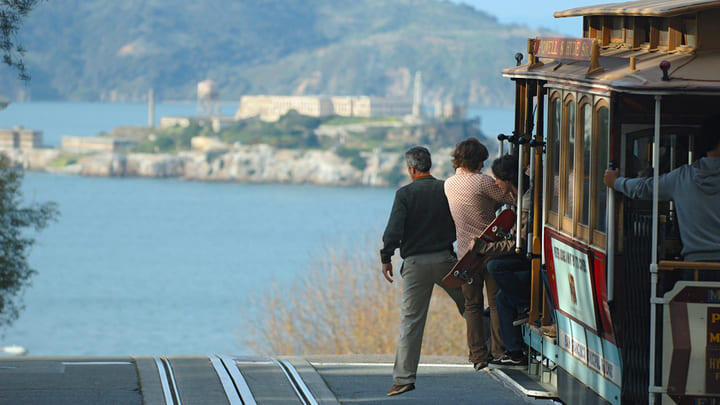 A San Francisco cable car overlooking Alcatraz Island