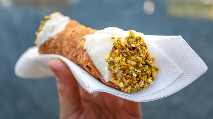 A cannoli fresh from the bakery