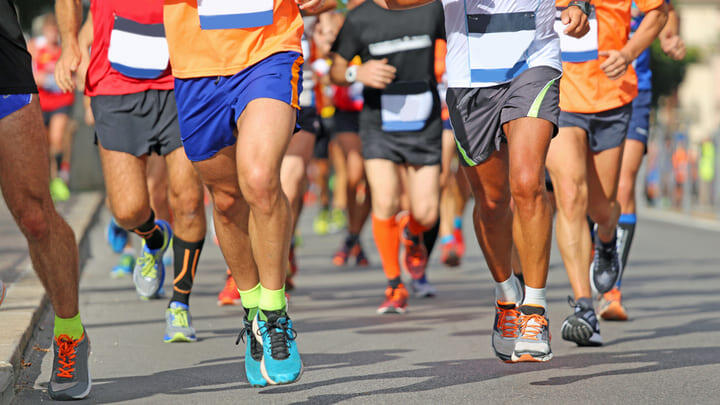 Runners competing in a city marathon