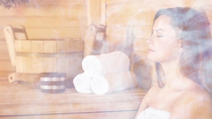 Woman relaxing in a steam room