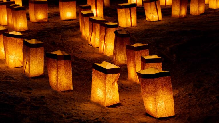 Farolito Christmas lanterns decorate windowsills and doorsteps at Christmas in Cancun
