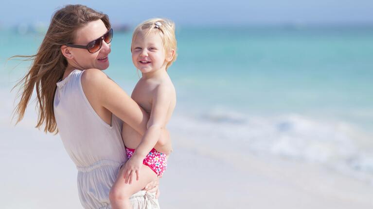 A mother and child enjoy the beaches outside Cancun