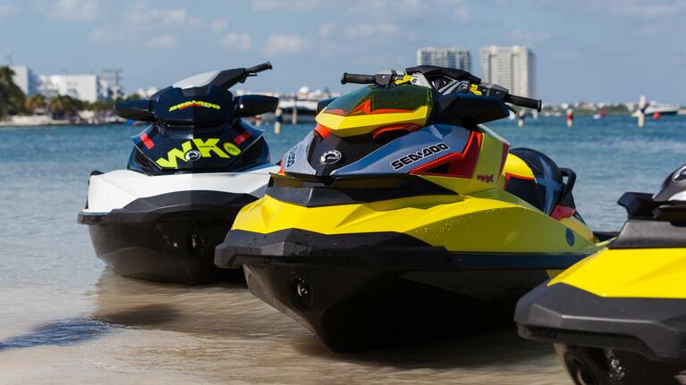 Jet skis await the next thrill seekers on a Cancun beach