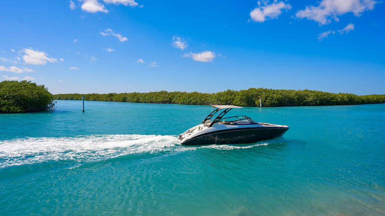 A speedboat travels across Cancun's Nichupte Lagoon
