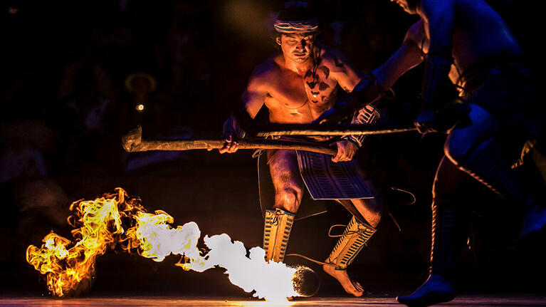 A performer plays with fire at Xcaret Park's nightly spectacular