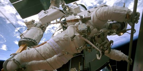 An astronaut floats overhead at the Fleet Science Center.