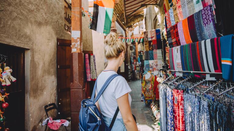 A traveler explores a Dubai souk