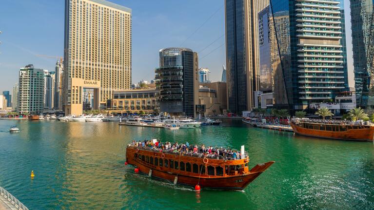 A dhow taking part in a cruise along Dubai Creek