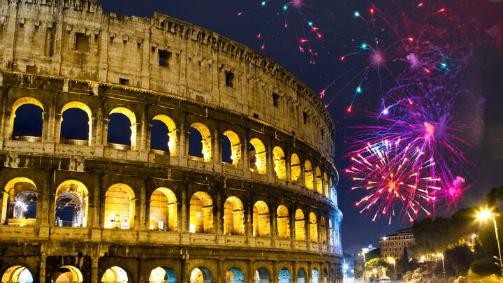 Fireworks in the night sky over the Colosseum