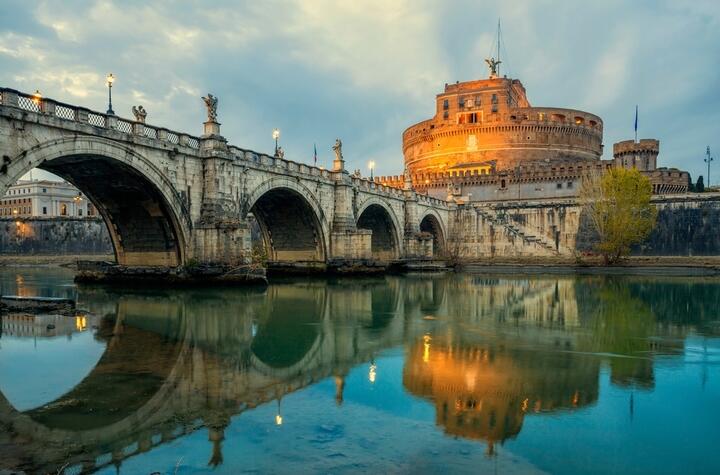 Castel Sant'Angelo reflected in the Tiber at twilight