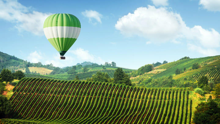 Hot-air balloon soaring over the Italian countryside