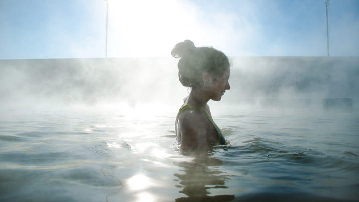 Woman relaxing in a thermal spa