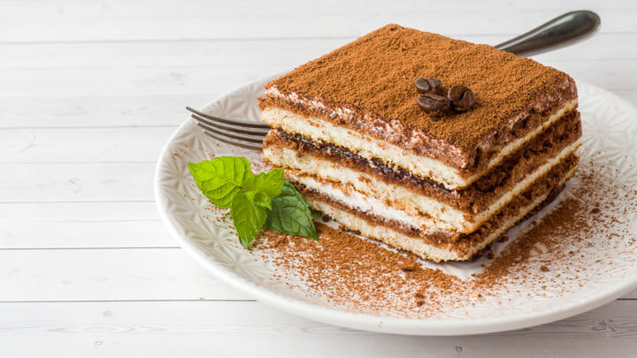 Large slice of tiramisu on a plate