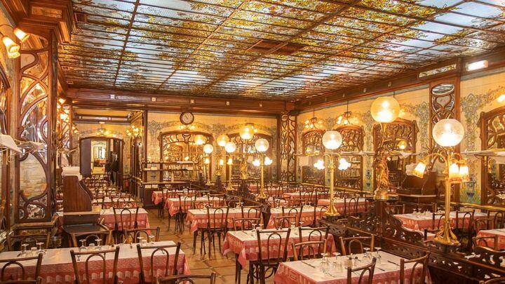 Sumptous red, gold and wood interior with painted glass ceiling, Bouillon Chartier bistro, Paris