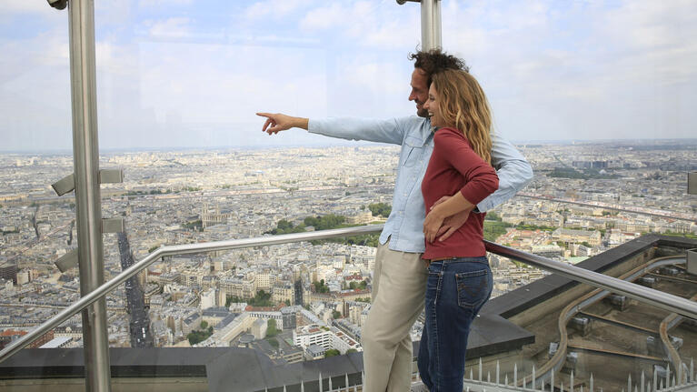 A couple take in the view from Tour Montparnasse