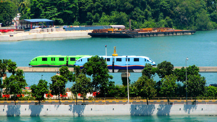 Two Sentosa Express monorail trains passing each other on Sentosa island