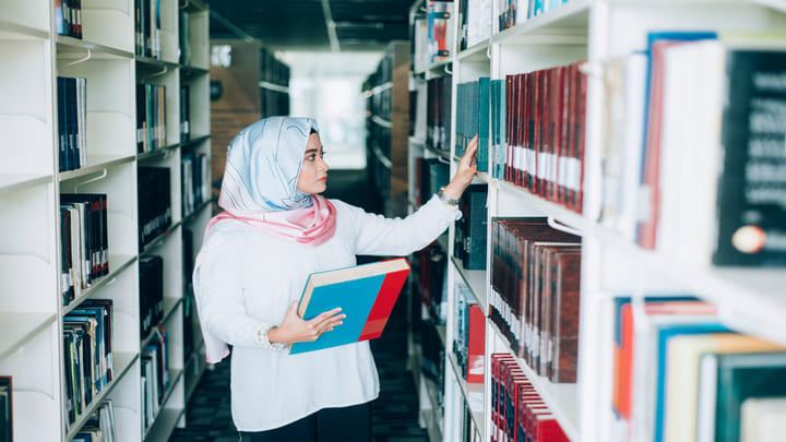Person searching for books