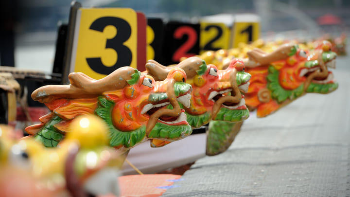 Colorful dragon boats at the dock in Singapore.