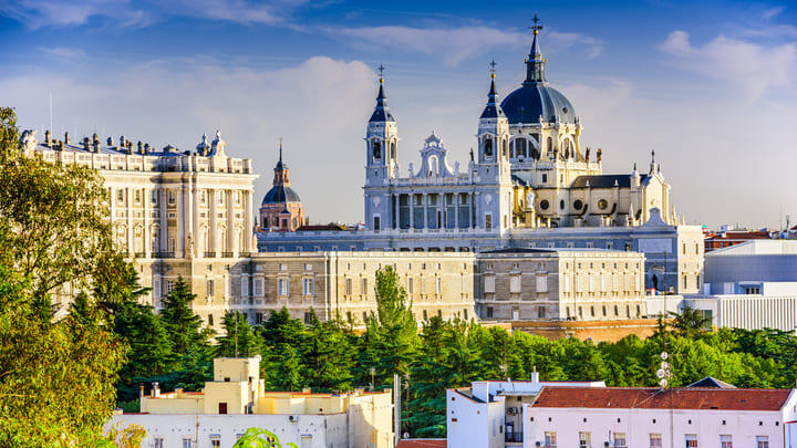 Madrid skyline with the Royal Palace and Almudena Cathedral in view.