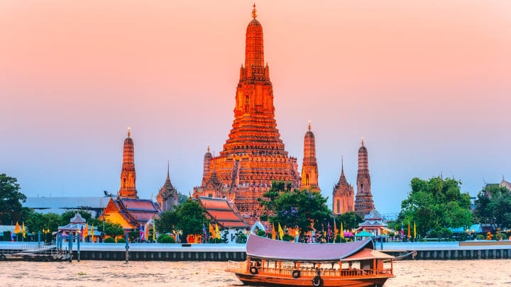 Wat Arun viewed from across the river at sunset.