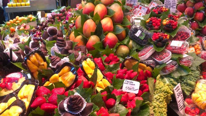 Close up of brightly coloured display of fruit La Boqueria market Barcelona