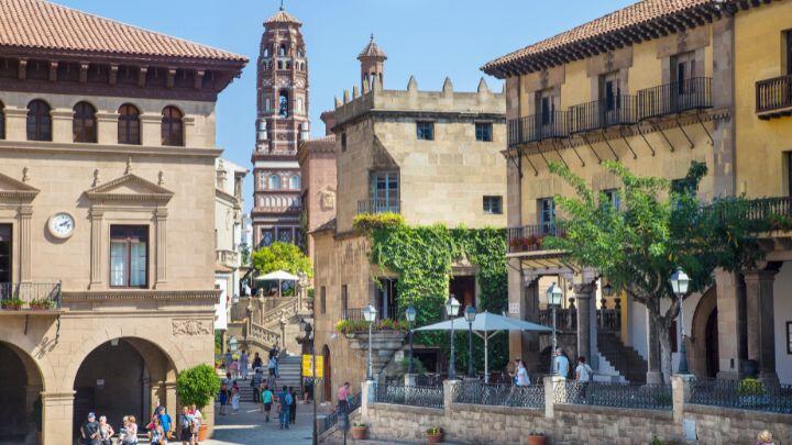 Traditional Spanish square, buildings and tower in Poble Espanyol Barcelona